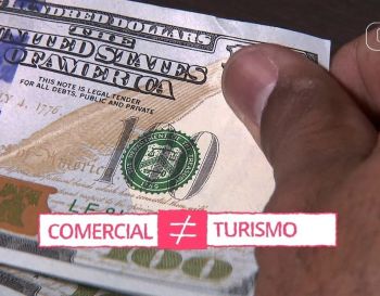 Por que o dólar turismo é mais caro que o comercial?